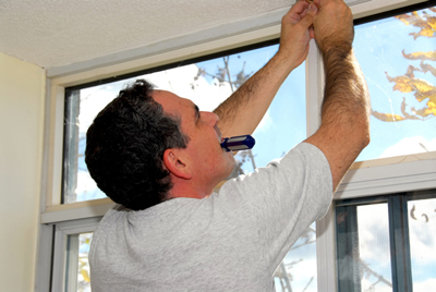 handyman-working-on-new-window